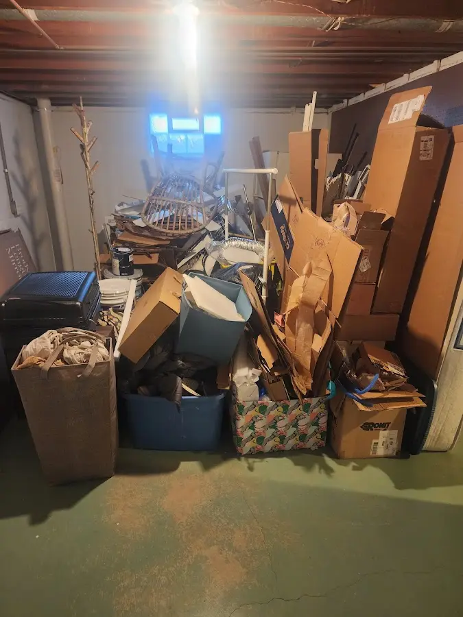 Roll-off dumpster container at job site for Yard Waste Dumpster Rental in North Valley